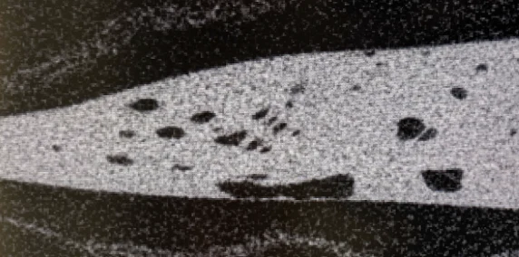 CT of an encapsulated trace before (left) and after (right) parameter optimization, shown at the same orientation